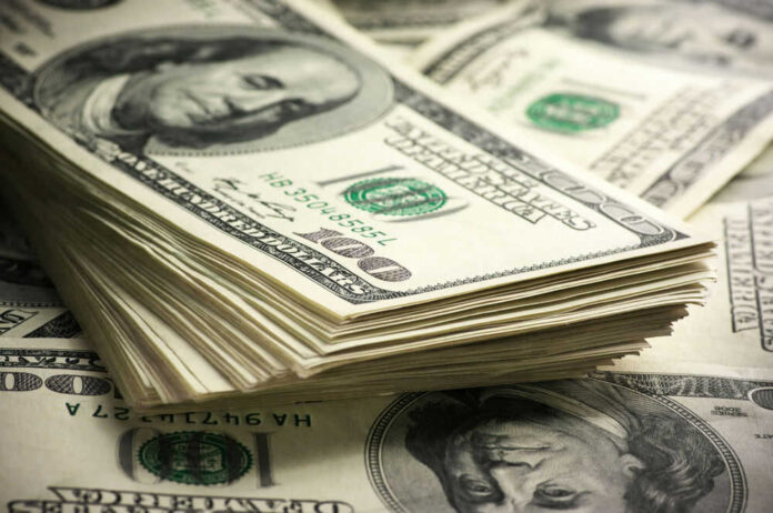 Stack of hundred dollar bills in closeup view
