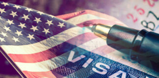 USA flag visa stamp and pen overlayed image